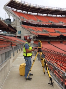 Survey Crew Chief Rocky Porterfield performs construction surveying for Beyonce OTR II concert stage in Cleveland.